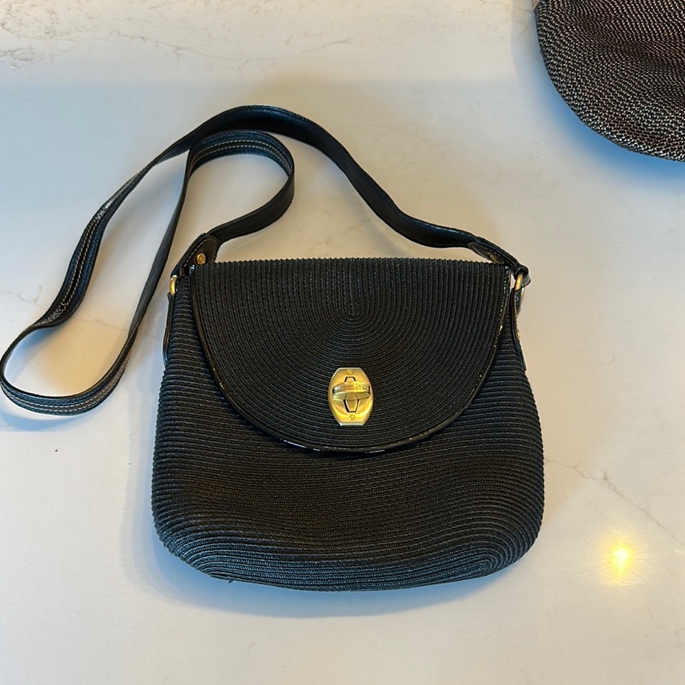 Black Crossbody Bag with Gold Clasp and Flap Closure
